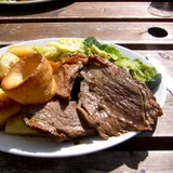 Roast beef with Yorkshire pudding and vegetables